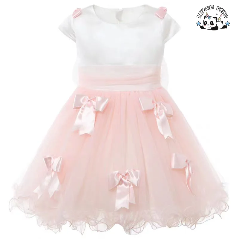 Atacado de novos produtos vestidos curtos com mangas curtas laços cor-de-rosa fofos últimos vestidos tutu para meninas crianças